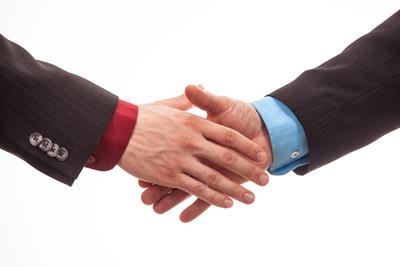 Business handshake in isolated white-stock-foto