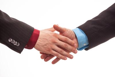 Business handshake in isolated white-stock-photo