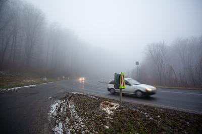 Moving car on highway with fog-stock-foto