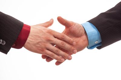 Business handshake in isolated white-stock-photo