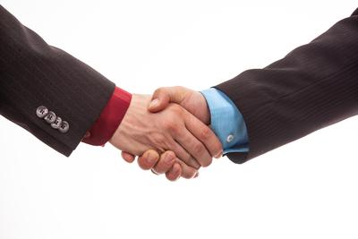 Business handshake in isolated white-stock-foto