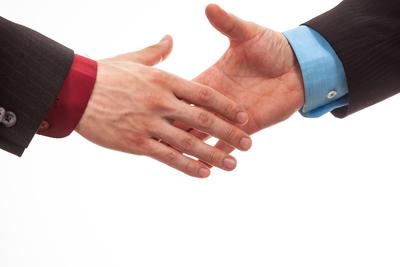 Business handshake in isolated white-stock-foto
