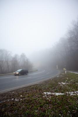 Moving car on highway with fog-stock-foto