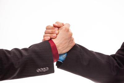 Business handshake in isolated white-stock-foto