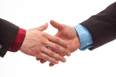 Business handshake in isolated white-stock-photo