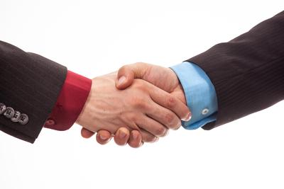 Business handshake in isolated white-stock-foto
