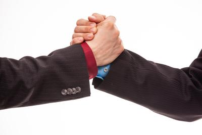 Business handshake in isolated white-stock-photo