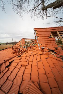 Broken roof after a storm-stock-photo