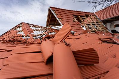 Broken roof after a storm-stock-photo