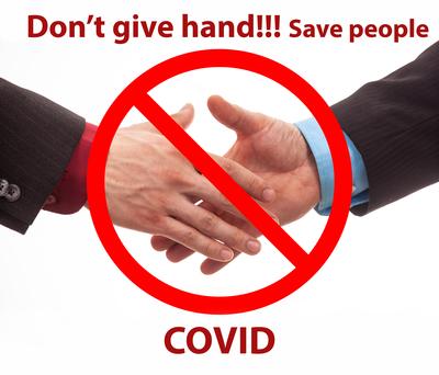 Business handshake in isolated white with coronavirus text-stock-photo