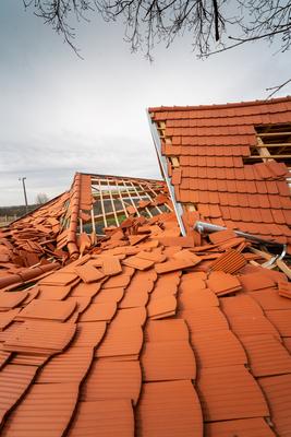 Broken roof after a storm-stock-photo