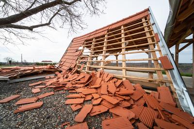 Broken roof after a storm-stock-photo