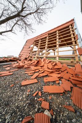 Broken roof after a storm-stock-photo