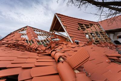 Broken roof after a storm-stock-photo