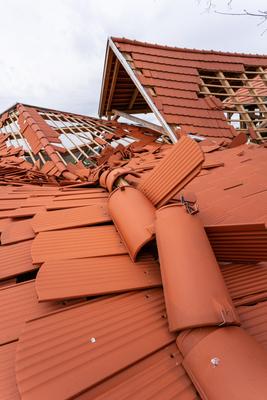 Broken roof after a storm-stock-photo