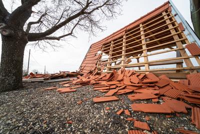 Broken roof after a storm-stock-photo