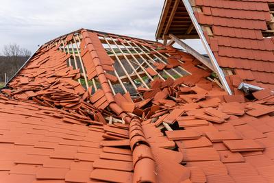 Broken roof after a storm-stock-photo