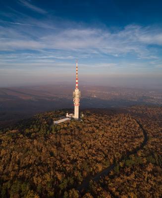 TV tower in Pecs Hungary with Mecsek hills-stock-foto