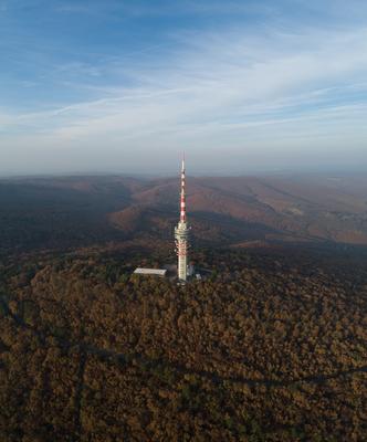 TV tower in Pecs Hungary with Mecsek hills-stock-foto