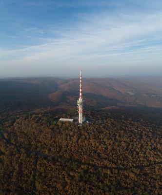 TV tower in Pecs Hungary with Mecsek hills-stock-photo