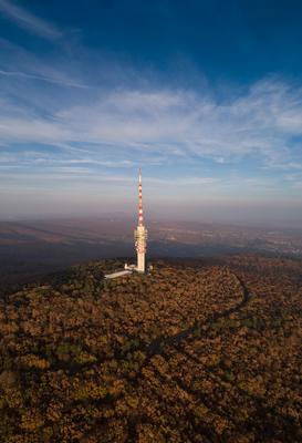 TV tower in Pecs Hungary with Mecsek hills-stock-foto