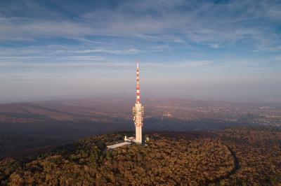TV tower in Pecs Hungary with Mecsek hills-stock-photo