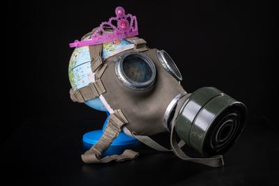 gas mask on a globe for coronavirus protection-stock-photo