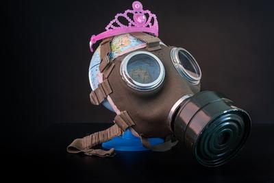 gas mask on a globe for coronavirus protection-stock-photo