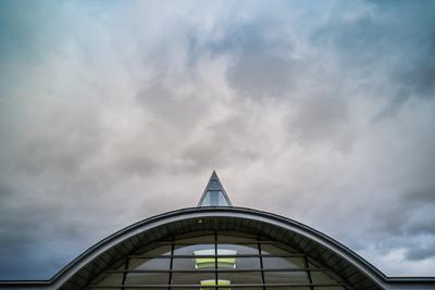 roof windows on a modern building  with cloudy sky-stock-photo