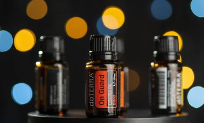 Pecs / Hungray - July 02 2020 - Illustrative editorial image of Doterra Essential Oils for everyday use on a dark shiny background-stock-photo
