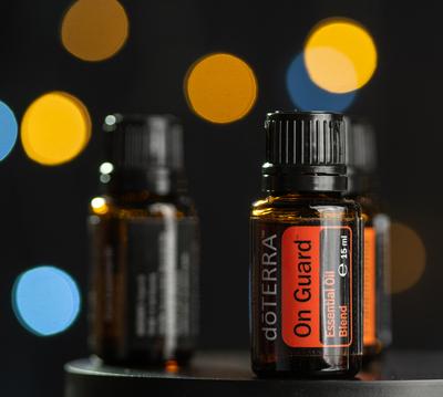 Pecs / Hungray - July 02 2020 - Illustrative editorial image of Doterra Essential Oils for everyday use on a dark shiny background-stock-photo