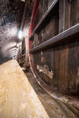 wooden barrels in old winery-stock-foto