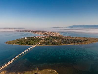 Aerial view of bridge to island Vir over the Adriatic sea in Croatia-stock-photo