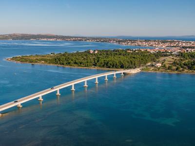 Aerial view of bridge to island Vir over the Adriatic sea in Croatia-stock-photo