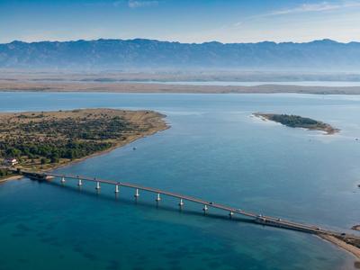 Aerial view of bridge to island Vir over the Adriatic sea in Croatia-stock-photo