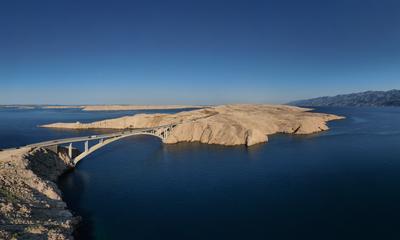 Panorama of croatian "Paski most" bridge connecting mainland with island Pag in Dalmatia-stock-photo