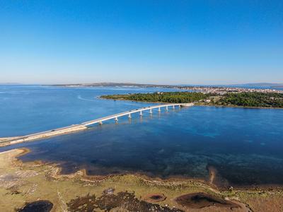 Aerial view of bridge to island Vir over the Adriatic sea in Croatia-stock-photo