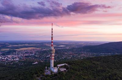 TV tower in Pecs Hungary with Mecsek hills-stock-photo