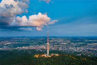 TV tower in Pecs Hungary with Mecsek hills-stock-photo