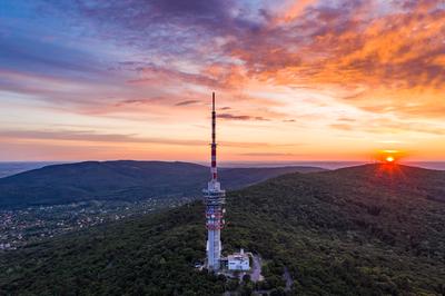 TV tower in Pecs Hungary with Mecsek hills-stock-photo