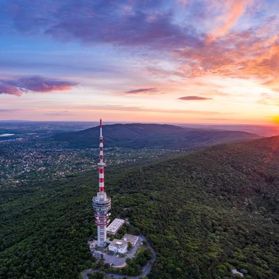 TV tower in Pecs Hungary with Mecsek hills-stock-photo