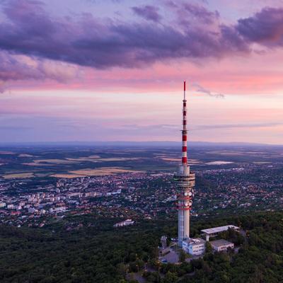 TV tower in Pecs Hungary with Mecsek hills-stock-photo