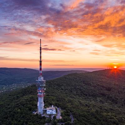 TV tower in Pecs Hungary with Mecsek hills-stock-photo