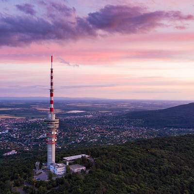 TV tower in Pecs Hungary with Mecsek hills-stock-photo