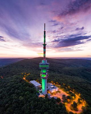 TV tower in Pecs Hungary with Mecsek hills-stock-photo