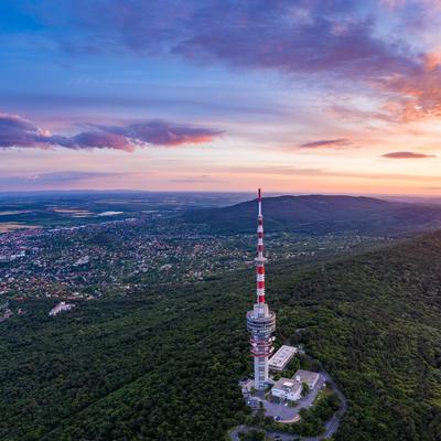 TV tower in Pecs Hungary with Mecsek hills-stock-photo