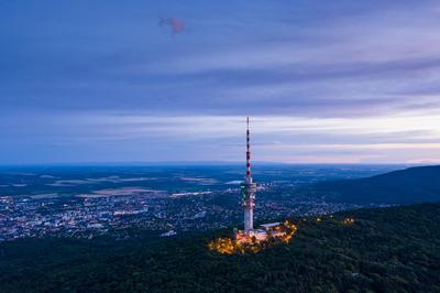 TV tower in Pecs Hungary with Mecsek hills-stock-photo