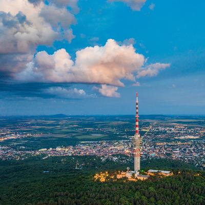 TV tower in Pecs Hungary with Mecsek hills-stock-photo