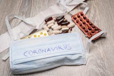Medical mask and tablets for Corona protection-stock-photo