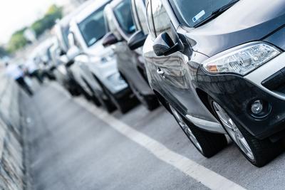 Many cars travelling on a road-stock-photo